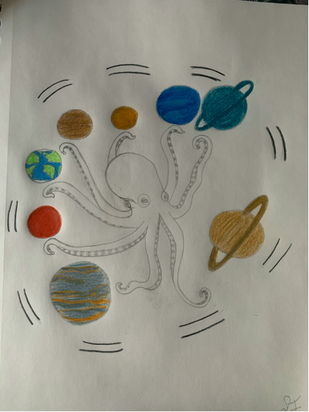 A photo Selina drew of an octopus and solar system.