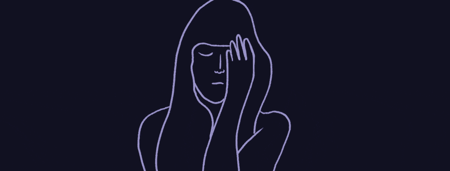 woman crying with hand over face
