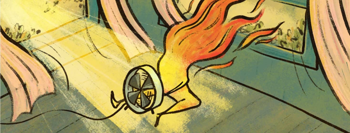 person on fire in front of a fan