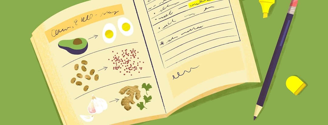 A journal is open and showing drawings of foods and scribbled notes.