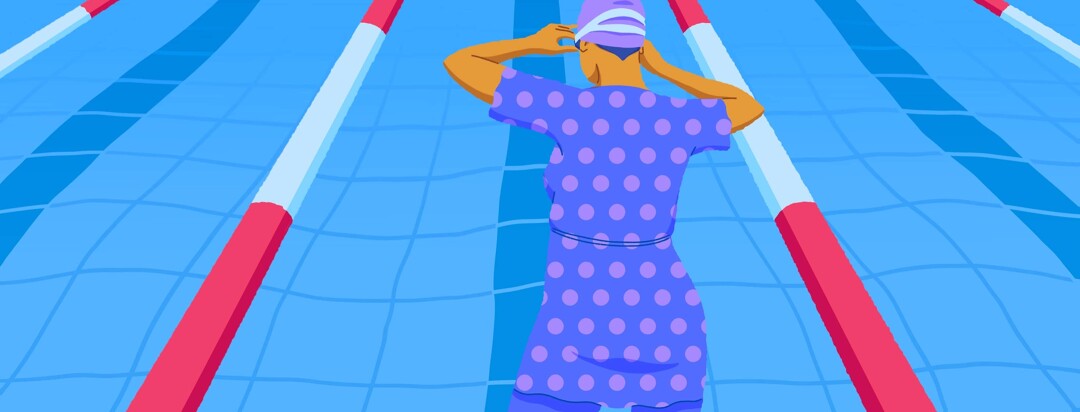 Adult woman about to dive into a lap pool while wearing modest but stylish swimwear